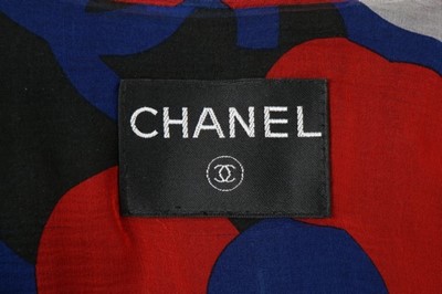 Lot 18 - A Chanel wool and printed silk ensemble, 2000,...
