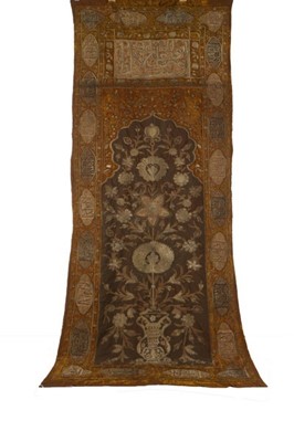 Lot 454 - A large embroidered velvet mehrab or prayer...