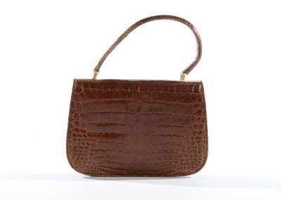 Lot 108 - A Gucci brown crocodile handbag, 1960s,...