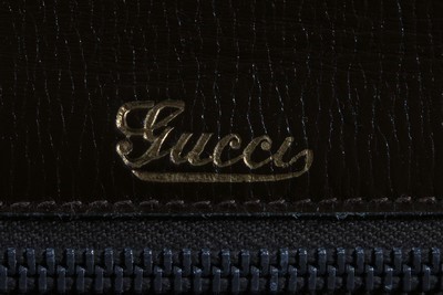 Lot 1 - A Gucci brown crocodile handbag, 1960s,...