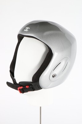 Lot 26 - A Chanel ski helmet, with silver finish, CC...