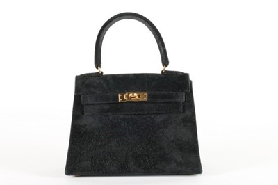 Lot 17 - An Hermès black suede miniature Kelly bag,...