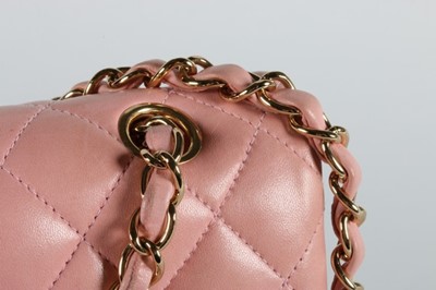Lot 22 - A Chanel pink leather double flap bag, stamped...