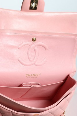 Lot 22 - A Chanel pink leather double flap bag, stamped...