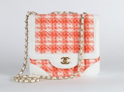 Lot 29 - A matching Chanel orange and white tweed...