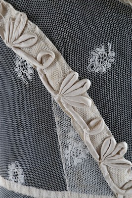 Lot 48 - A tamboured net dress, circa 1825, embroidered...