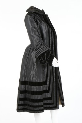 Lot 57 - A Paquin couture black taffeta and velvet coat,...