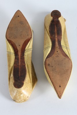 Lot 51 - A pair of yellow leather ladies shoes with...