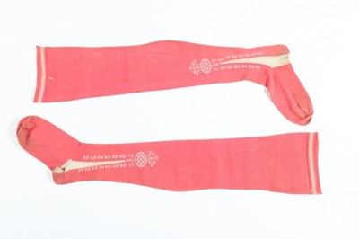 Lot 39 - A pair of frame-knitted salmon-pink silk...