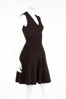 Lot 261 - An Azzedine Alaïa brown textured knit dress,...