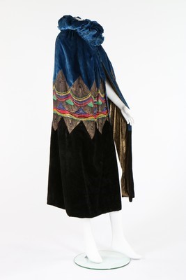 Lot 63 - A velvet and lamé opera cape, mid 1920s, of...
