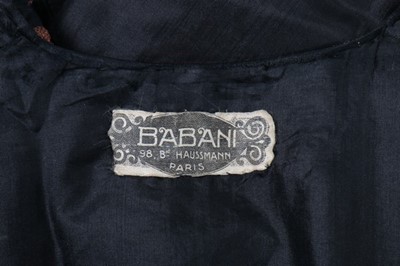 Lot 66 - A Vitaldi Babani embroidered black satin...