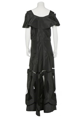Lot 132 - A couture black taffeta evening gown with pink...