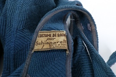 Lot 76 - A rare Schiaparelli knitted blue wool swimsuit,...