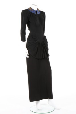 Lot 82 - A black crpe dress with sequined collar,...