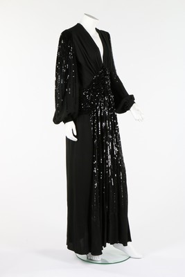 Lot 92 - A Gaston couture black sequined evening gown,...