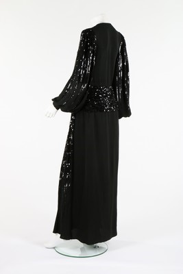 Lot 92 - A Gaston couture black sequined evening gown,...