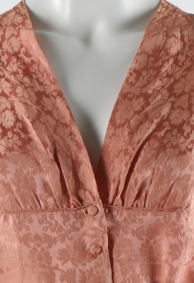 Lot 78 - A Balenciaga couture pale pink damask blouse,...