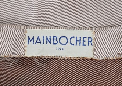 Lot 79 - A Mainbocher Inc beige silk faille cocktail...