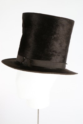 Lot 43 - A gentleman's dark brown beaver stove-pipe hat,...