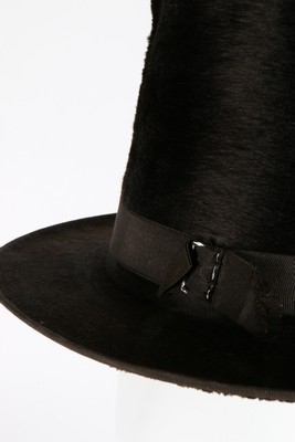 Lot 43 - A gentleman's dark brown beaver stove-pipe hat,...