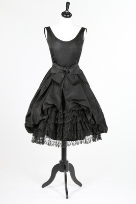 Lot 96 - An Yves Saint Laurent for Dior black taffeta...