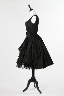 Lot 96 - An Yves Saint Laurent for Dior black taffeta...