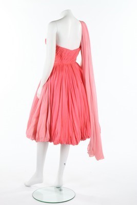 Lot 102 - A pink draped chiffon couture cocktail dress,...