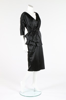 Lot 95 - A Balenciaga couture black satin dinner dress,...