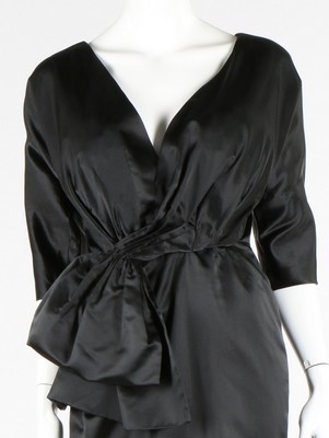 Lot 95 - A Balenciaga couture black satin dinner dress,...