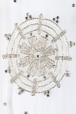 Lot 117 - A Mila Schn couture embroidered silver evening...