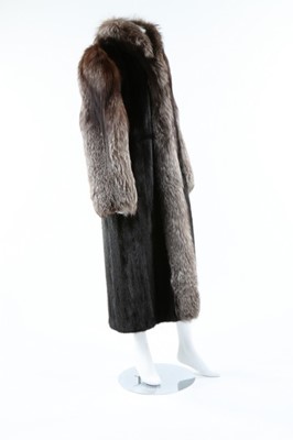 Lot 58 - A black mink and fox fur coat, 1980s, labelled...