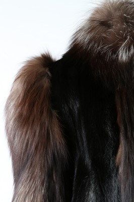 Lot 58 - A black mink and fox fur coat, 1980s, labelled...