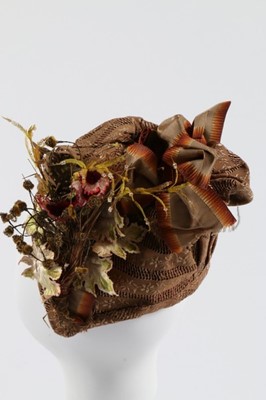 Lot 71 - A brown figured silk bonnet, circa 1890,...