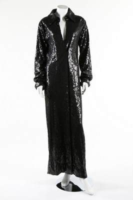 Lot 78 - A Halston black sequined maxi coat, probably...