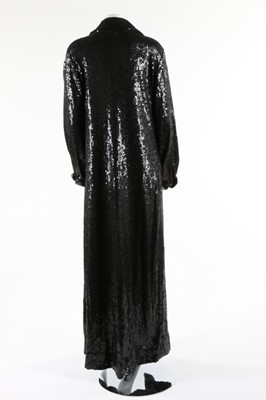 Lot 78 - A Halston black sequined maxi coat, probably...