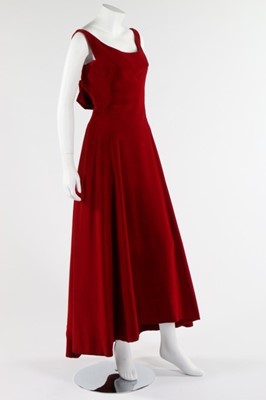 Lot 85 - A Fontana Sisters burgundy velvet evening gown,...
