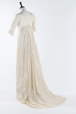 Lot 119 - A whitework embroidered empire-line muslin...