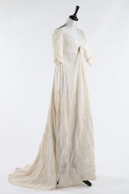 Lot 119 - A whitework embroidered empire-line muslin...