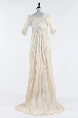 Lot 119 - A whitework embroidered empire-line muslin...