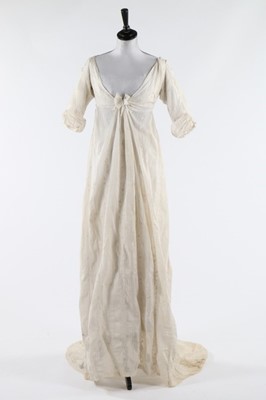 Lot 119 - A whitework embroidered empire-line muslin...