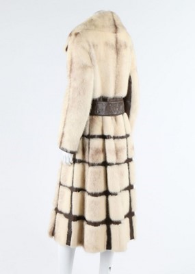 Lot 121 - A mink coat with brown leather trim, circa...