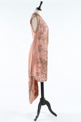 Lot 129 - A finely embroidered empire-style couture pink...