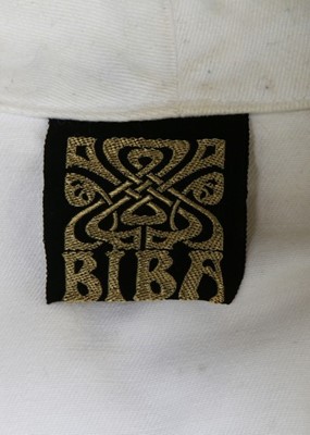 Lot 150 - A Biba white cotton trouser suit, early 1970s,...