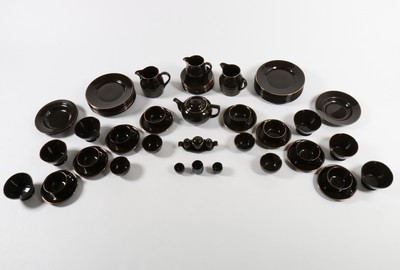 Lot 164 - An unmarked Biba brown ceramic dinner service,...