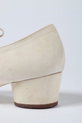 Lot 131 - A pair of Ferragamo 'Ferrina' white suede...