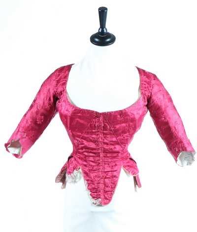 Lot 169 - A wine damask satin lady's bodice, 1770s, with...