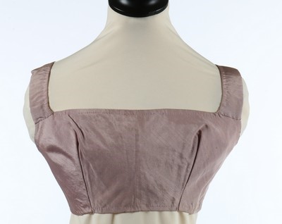 Lot 169 - A wine damask satin lady's bodice, 1770s, with...
