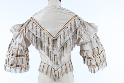 Lot 170 - A printed muslin day dress, late 1840s, with...