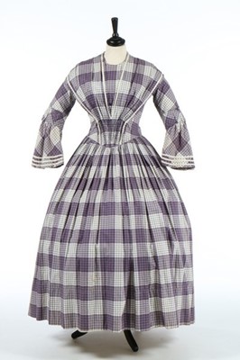 Lot 170 - A printed muslin day dress, late 1840s, with...
